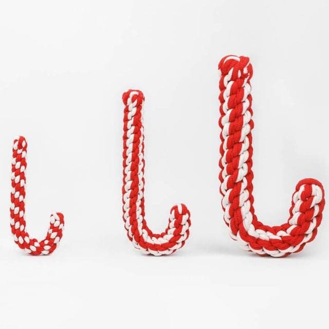Three red and white braided rope candy cane dog toys
